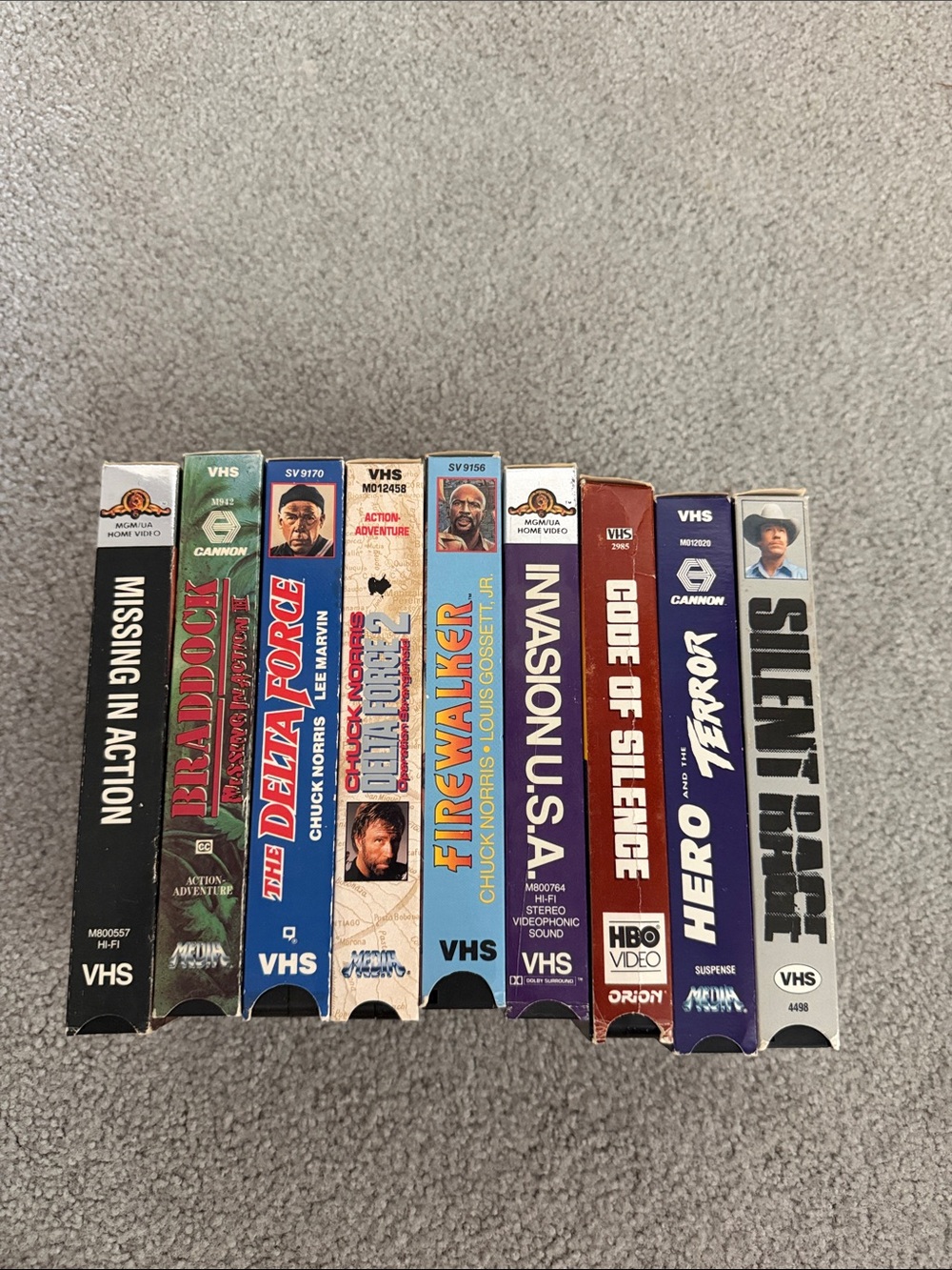classic Chuck Norris action movie VHS tapes from the 1980s and 1990s,